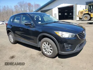 2016 Mazda CX-5 Sport with VIN JM3KE4BY8G0749246, listed as a Copart auction lot 52644655 with 117,753 mi miles and Clean Title. Bid and sale history available at carsss.com. Image 4.