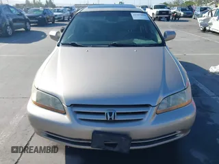 2001 Honda Accord EX z VIN JHMCG66801C010759, wystawiony jako IAAI lot #42303890 z przebiegiem 216 143 mil mil oraz . Historia ofert i sprzedaży dostępna na DreamBid. Obrazek 12.