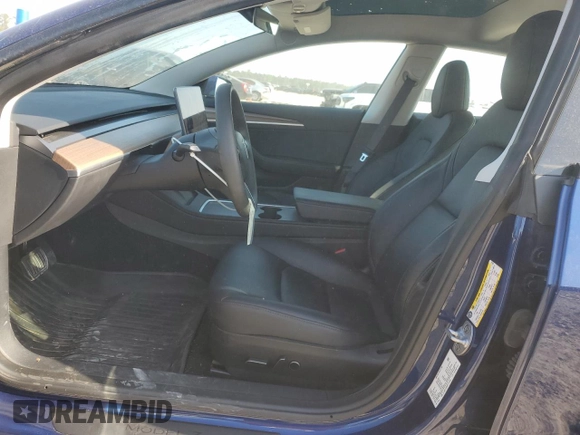 2023 Tesla Model 3 z VIN 5YJ3E1EA9PF712542, wystawiony jako Copart lot #52124295 z przebiegiem 13 154 mil mil oraz Czysty tytuł • Clean title. Historia ofert i sprzedaży dostępna na DreamBid. Obrazek 7.