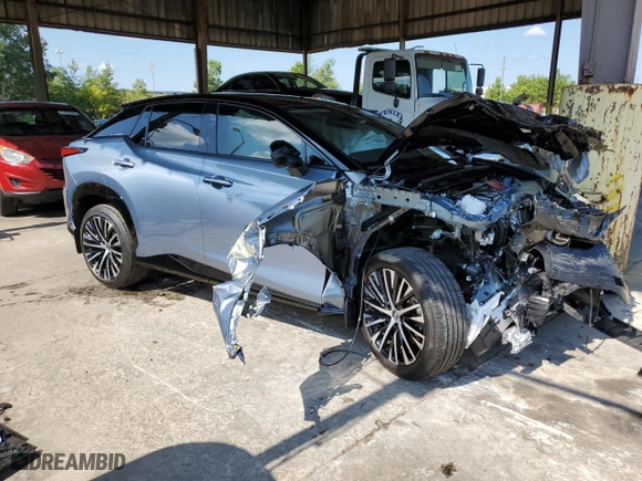 2023 Lexus RZ with VIN JTJAAAAB6PA002943, listed as a Copart auction lot 60852184 with 3,760 mi miles and Salvage Title. Bid and sale history available at carsss.com. Image 4.