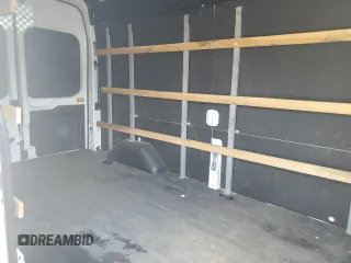 2021 Ford Transit Cargo с VIN 1FTBR1X80MKA26754, выставлен на аукционе Copart как лот 57982185 с пробегом 80 537 миль миль и Списание • Salvage title. История ставок и продаж доступна на DreamBid. Изображение 11.