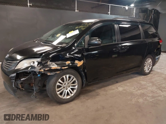 2012 Toyota Sienna XLE AAS with VIN 5TDYK3DCXCS208178, listed as a IAAI auction lot 41788262 with 329,823 mi miles and . Bid and sale history available at carsss.com. Image 6.