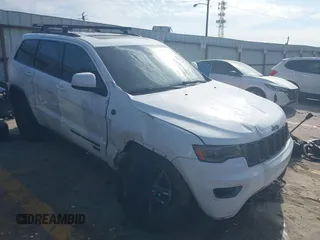 2016 Jeep Grand Cherokee Laredo z VIN 1C4RJFAG1GC425884, wystawiony jako IAAI lot #42060776 z przebiegiem 111 619 mil mil oraz . Historia ofert i sprzedaży dostępna na DreamBid. Obrazek 1.