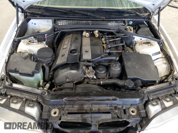 2002 BMW 3 Series 325Ci with VIN WBABN33472JW52750, listed as a Copart auction lot 79733074 with 188,991 mi miles and Salvage title. Bid and sale history available at DreamBid. Image 11.
