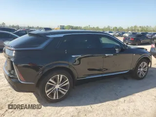 2024 Cadillac LYRIQ Luxury z VIN 1GYKPPRK1RZ137520, wystawiony jako Copart lot #50578095 z przebiegiem 6815 mil mil oraz Szkody całkowita. Historia ofert i sprzedaży dostępna na DreamBid. Obrazek 3.