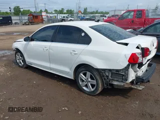 2013 Volkswagen Jetta TDI w/Premium/Nav with VIN 3VWLL7AJ3DM418377, listed as a IAAI auction lot 42768223 with 149,241 mi miles and . Bid and sale history available at DreamBid. Image 3.