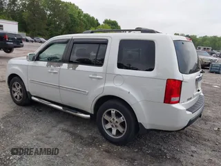 2011 Honda Pilot Touring z VIN 5FNYF4H9XBB053966, wystawiony jako IAAI lot #42148528 z przebiegiem 191 939 mil mil oraz . Historia ofert i sprzedaży dostępna na DreamBid. Obrazek 3.