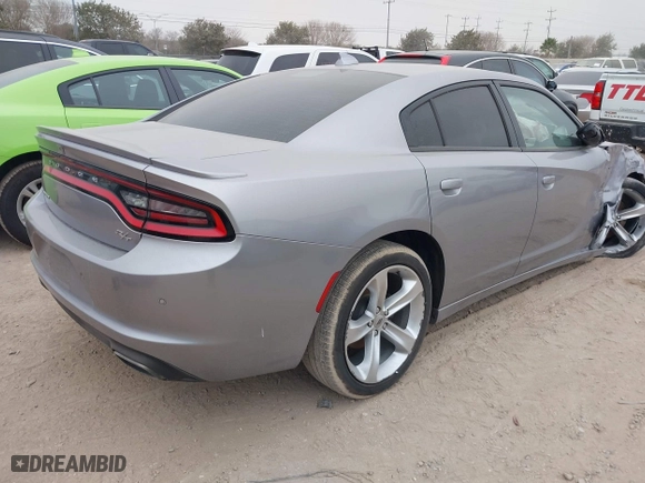 2018 Dodge Charger R/T with VIN 2C3CDXCTXJH148030, listed as a IAAI auction lot 41225873 with 105,069 mi miles. Bid and sale history available at carsss.com. Image 4.