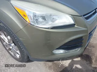 2013 Ford Escape SEL с VIN 1FMCU9H99DUC87471, выставлен на аукционе IAAI как лот 41863601 с пробегом 225 429 миль миль и . История ставок и продаж доступна на DreamBid. Изображение 14.