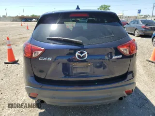 2014 Mazda CX-5 Touring with VIN JM3KE2CY7E0362879, listed as a Copart auction lot 53079545 with 70,863 mi miles and Salvage Title. Bid and sale history available at carsss.com. Image 6.