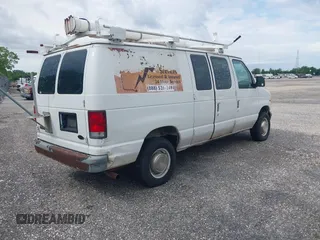 2000 Ford Econoline Cargo with VIN 1FTNE24L8YHB14204, listed as a IAAI auction lot 42151691 with 240,475 mi miles and . Bid and sale history available at DreamBid. Image 4.