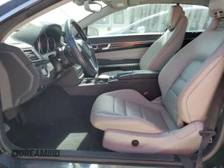 2015 Mercedes-Benz E 400 with VIN WDDKK6FFXFF301128, listed as a Copart auction lot 76691954 with 49,313 mi miles and Salvage title. Bid and sale history available at DreamBid. Image 7.
