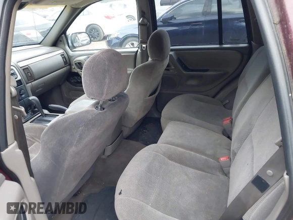 2001 Jeep Grand Cherokee Laredo z VIN 1J4GX48S41C585151, wystawiony jako IAAI lot #41020660 z przebiegiem Nie podano mil oraz . Historia ofert i sprzedaży dostępna na DreamBid. Obrazek 8.