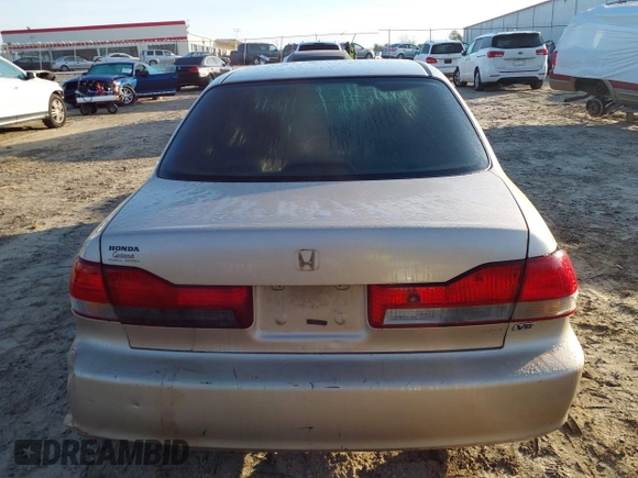 2002 Honda Accord EX z VIN 1HGCG16522A065397, wystawiony jako IAAI lot #41790485 z przebiegiem 223 389 mil mil oraz . Historia ofert i sprzedaży dostępna na DreamBid. Obrazek 16.