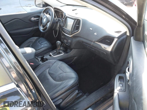 2014 Jeep Cherokee Limited with VIN 1C4PJMDB9EW210180, listed as a IAAI auction lot 41302037 with 75,177 mi miles and . Bid and sale history available at DreamBid. Image 5.