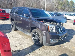2017 GMC Yukon SLE with VIN 1GKS1AKC6HR343149, listed as a IAAI auction lot 41475728 with 102,508 mi miles. Bid and sale history available at carsss.com. Image 1.