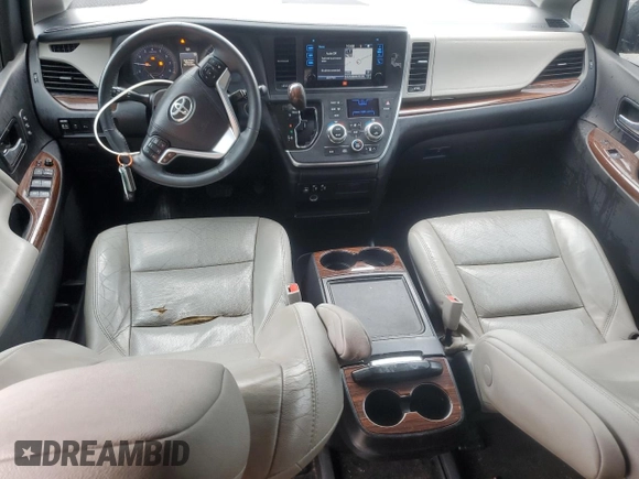 2016 Toyota Sienna XLE с VIN 5TDYK3DC8GS749610, выставлен на аукционе Copart как лот 57579215 с пробегом 167 554 миль миль и Списание • Salvage title. История ставок и продаж доступна на DreamBid. Изображение 8.