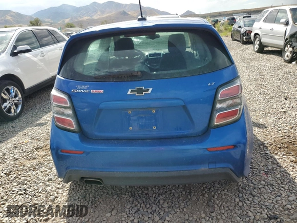 2018 Chevrolet Sonic LT with VIN 1G1JD6SB1J4115929, listed as a Copart auction lot 68690124 with 98,532 mi miles and Salvage title. Bid and sale history available at DreamBid. Image 6.