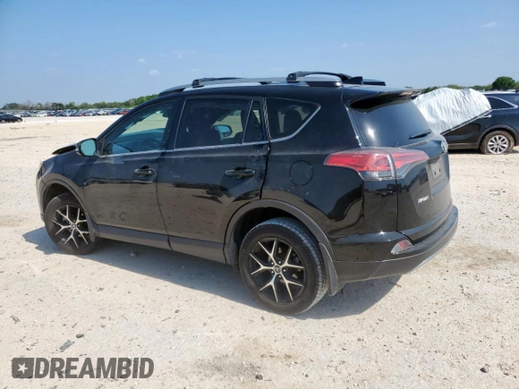 2018 Toyota RAV4 SE with VIN 2T3NFREV6JW436488, listed as a Copart auction lot 60297905 with 74,034 mi miles and Salvage title. Bid and sale history available at DreamBid. Image 2.