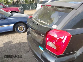 2007 Dodge Caliber SXT with VIN 1B3HB48B57D159305, listed as a IAAI auction lot 42095938 with 120,684 mi miles and . Bid and sale history available at DreamBid. Image 6.
