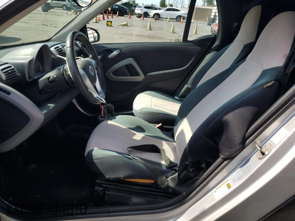 2009 Smart fortwo Passion with VIN WMEEK31X59K232027, listed as a Copart auction lot 55982195 with 63,945 mi miles and Salvage Title. Bid and sale history available at DreamBid. Image 7.