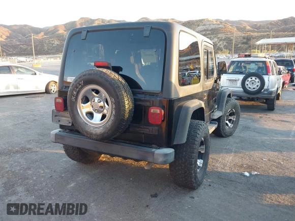 2004 Jeep Wrangler SE with VIN 1J4FA29184P762210, listed as a IAAI auction lot 40983051 with 107,525 mi miles and . Bid and sale history available at DreamBid. Image 4.