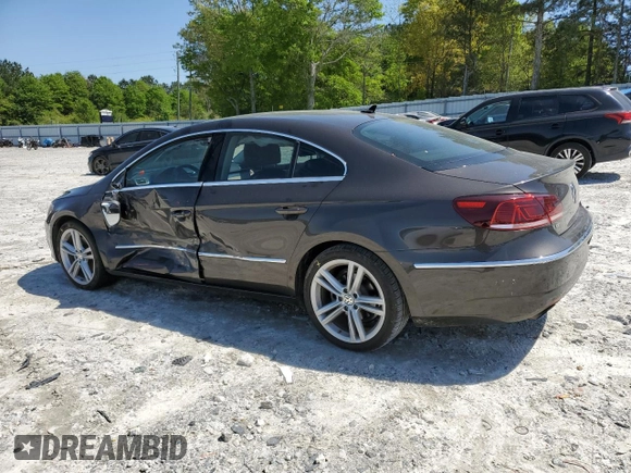 2013 Volkswagen CC Lux with VIN WVWRN7AN4DE546711, listed as a Copart auction lot 52673205 with 106,700 mi miles and Salvage Title. Bid and sale history available at DreamBid. Image 2.