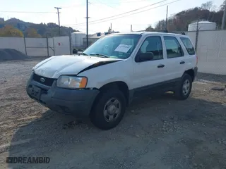 2003 Ford Escape XLS Popular with VIN 1FMYU92183KB46619, listed as a IAAI auction lot 40695244 with 0 mi miles. Bid and sale history available at carsss.com. Image 16.