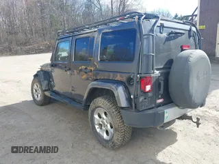 2014 Jeep Wrangler Unlimited Sahara с VIN 1C4BJWEG3EL267279, выставлен на аукционе IAAI как лот 42083836 с пробегом 81 796 миль миль и . История ставок и продаж доступна на DreamBid. Изображение 3.