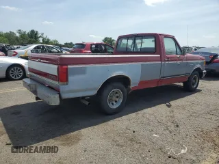 1990 Ford F-150 with VIN 1FTDF15NXLNA61972, listed as a Copart auction lot 60354815 with 21,243 mi miles and Clean title. Bid and sale history available at DreamBid. Image 3.