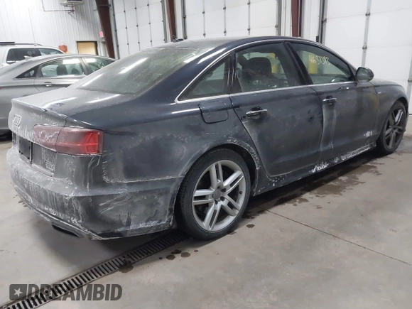 2016 Audi A6 Premium Plus z VIN WAUGFAFCXGN104249, wystawiony jako IAAI lot #41631393 z przebiegiem 117 516 mil mil oraz . Historia ofert i sprzedaży dostępna na DreamBid. Obrazek 4.