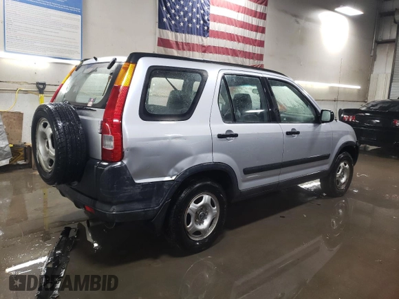 2002 Honda CR-V LX with VIN JHLRD68512C009941, listed as a Copart auction lot 87699075 with 133,311 mi miles and Salvage Title. Bid and sale history available at DreamBid. Image 3.