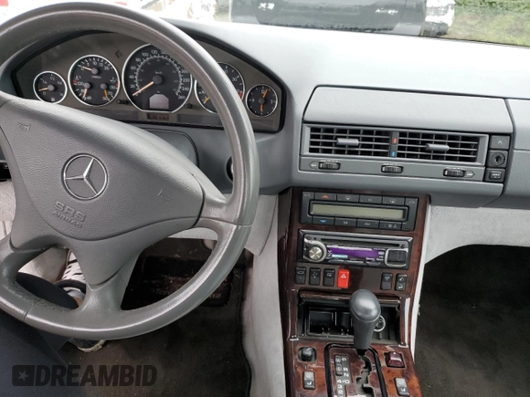 2001 Mercedes-Benz SL 500 with VIN WDBFA68F01F198112, listed as a Copart auction lot 77034114 with 114,049 mi miles and Salvage title. Bid and sale history available at DreamBid. Image 8.