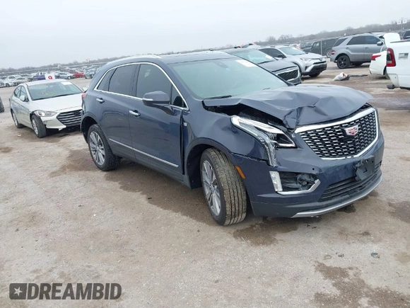 2024 Cadillac XT5 FWD Premium Luxury with VIN 1GYKNCR47RZ755652, listed as a IAAI auction lot 41512069 with 10,243 mi miles. Bid and sale history available at carsss.com. Image 1.