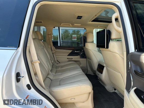 2017 Lexus LX 570 z VIN JTJHY7AX7H4243757, wystawiony jako Copart lot #66006545 z przebiegiem 94 422 mil mil oraz Czysty tytuł • Clean title. Historia ofert i sprzedaży dostępna na DreamBid. Obrazek 6.