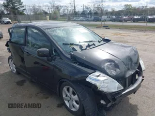 2011 Nissan Versa 1.8 S with VIN 3N1BC1CP4BL374120, listed as a IAAI auction lot 41931328 with 151,929 mi miles. Bid and sale history available at carsss.com. Image 1.