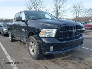 2014 Ram 1500 Express with VIN 1C6RR7KTXES331605, listed as a IAAI auction lot 41618433 with 137,906 mi miles. Bid and sale history available at carsss.com. Image 1.