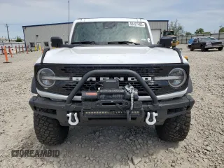 2022 Ford Bronco z VIN 1FMEE5DP4NLB67541, wystawiony jako Copart lot #58427485 z przebiegiem 67 774 mil mil oraz Szkoda całkowita • Salvage title. Historia ofert i sprzedaży dostępna na DreamBid. Obrazek 5.