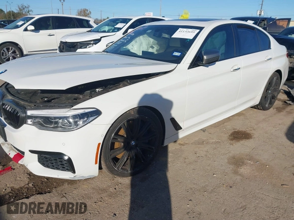 2018 BMW 5 Series M550i xDrive with VIN WBAJB9C54JB050218, listed as a IAAI auction lot 41132695 with 69,659 mi miles. Bid and sale history available at carsss.com. Image 16.