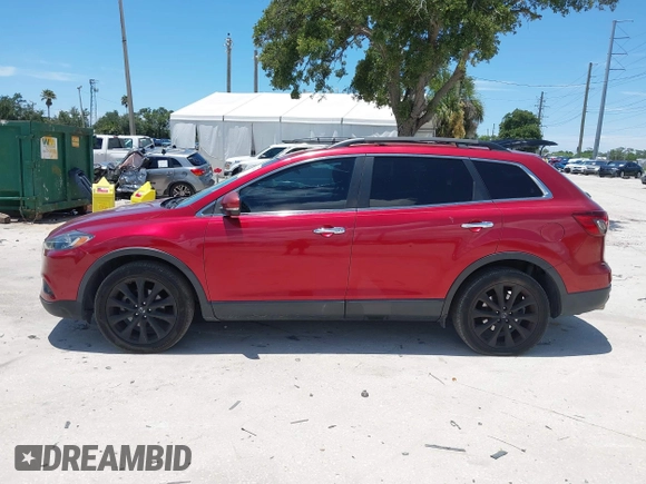 2015 Mazda CX-9 Grand Touring с VIN JM3TB2DA5F0464844, выставлен на аукционе IAAI как лот 42671898 с пробегом 164 165 миль миль и . История ставок и продаж доступна на DreamBid. Изображение 14.