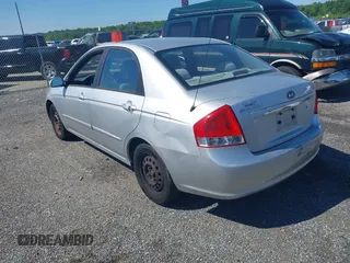 2009 Kia Spectra EX with VIN KNAFE222695665195, listed as a IAAI auction lot 42227515 with 129,637 mi miles and . Bid and sale history available at DreamBid. Image 3.