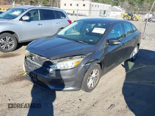 2015 Ford Focus SE with VIN 1FADP3F26FL280298, listed as a IAAI auction lot 40852000 with 144,805 mi miles and . Bid and sale history available at DreamBid. Image 17.