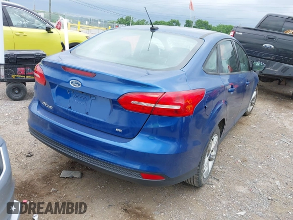 2018 Ford Focus SE z VIN 1FADP3F21JL212029, wystawiony jako IAAI lot #42258350 z przebiegiem 91 939 mil mil oraz . Historia ofert i sprzedaży dostępna na DreamBid. Obrazek 4.