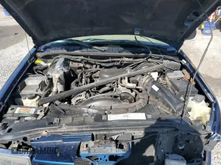 2001 Chevrolet Blazer LT z VIN 1GNCS13W812221839, wystawiony jako Copart lot #57048485 z przebiegiem 119 961 mil mil oraz Szkoda całkowita • Salvage title. Historia ofert i sprzedaży dostępna na DreamBid. Obrazek 12.