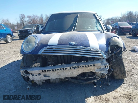 2004 MINI Hardtop with VIN WMWRC33444TC55222, listed as a IAAI auction lot 41854056 with 145,811 mi miles and . Bid and sale history available at DreamBid. Image 6.