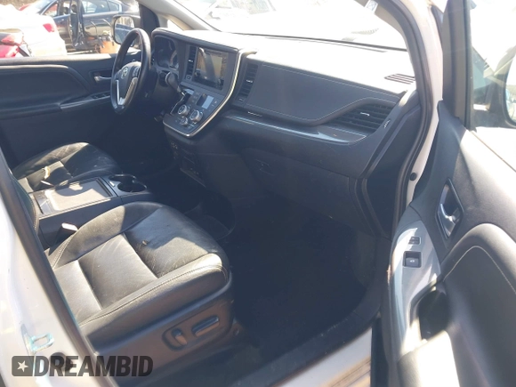 2015 Toyota Sienna SE with VIN 5TDXK3DC4FS658148, listed as a IAAI auction lot 41601341 with 110,329 mi miles. Bid and sale history available at carsss.com. Image 5.