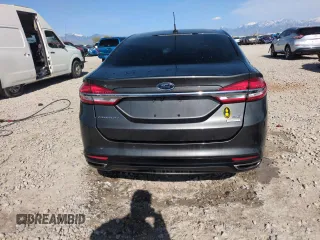 2017 Ford Fusion SE z VIN 3FA6P0H98HR350163, wystawiony jako Copart lot #54196545 z przebiegiem Nie podano mil oraz Szkoda całkowita • Salvage title. Historia ofert i sprzedaży dostępna na DreamBid. Obrazek 6.