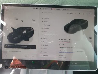 2022 Tesla Model Y Performance z VIN 7SAYGDEF7NF523532, wystawiony jako Copart lot #59949915 z przebiegiem 50 428 mil mil oraz Szkoda całkowita • Salvage title. Historia ofert i sprzedaży dostępna na DreamBid. Obrazek 9.