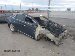 2017 Cadillac XTS Luxury z VIN 2G61M5S37H9182927, wystawiony jako IAAI lot #41083697 z przebiegiem Nie podano mil oraz . Historia ofert i sprzedaży dostępna na DreamBid. Obrazek 1.