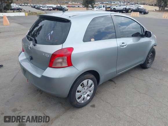 2007 Toyota Yaris with VIN JTDJT923675117537, listed as a IAAI auction lot 42116893 with 210,036 mi miles. Bid and sale history available at carsss.com. Image 4.